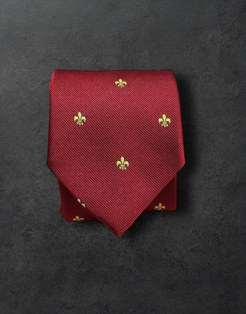 Corbata seda jacquard burdeos flor lis oro