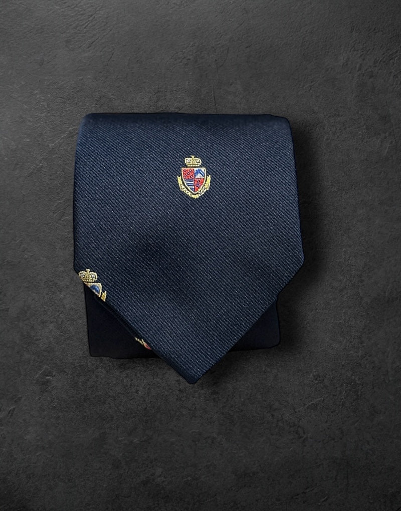 Corbata seda jacquard escudos marino