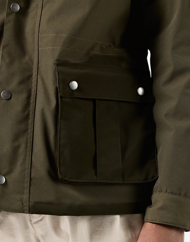 Parka verde cuatro bolsillos