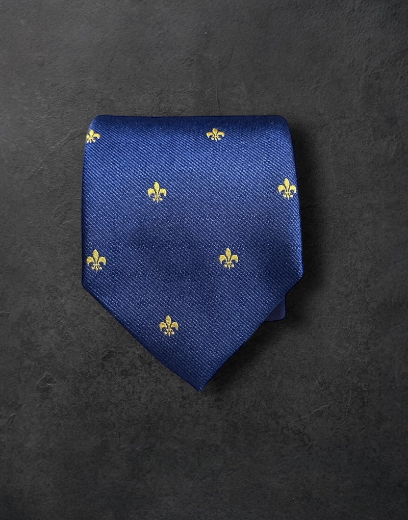 Corbata seda jacquard azul flor lis oro