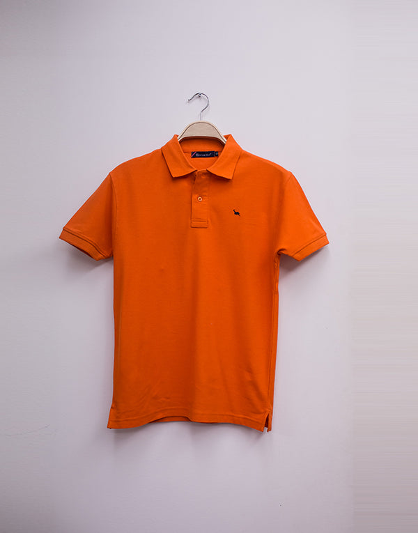 Polo piqué liso manga corta naranja